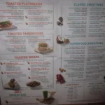 Tropical Smoothie Cafe menu with smoothies, bowls, wraps and breakfast items