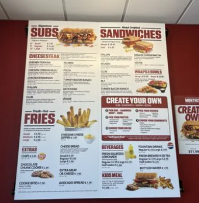 Penn Station menu with prices featuring grilled subs, cheesesteaks, cold sandwiches, fresh-cut fries, wraps, salads, and beverages in the USA.